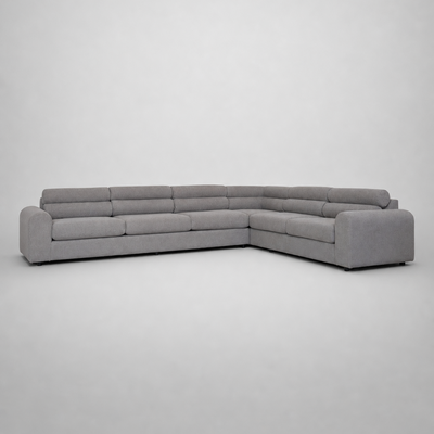 A modern light gray fabric sectional sofa with a low-profile, blocky design,